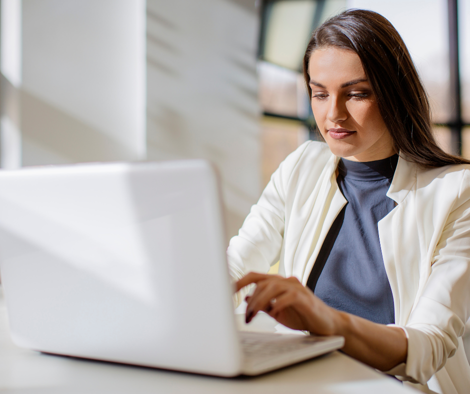 A woman at a laptop